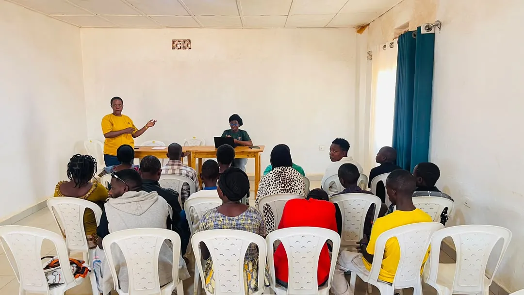 The Ongera Ubeho team leading their first community session with youth and parents in Kigali